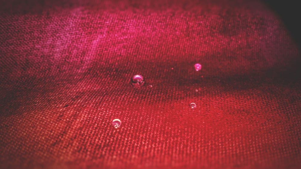 Water droplets on a fabric surface