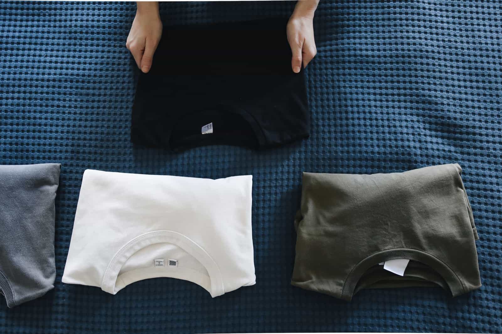 Clean folded laundry on a windowsill