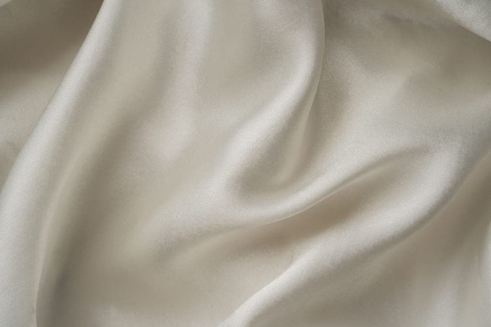 Flowing viscose fabric draped in soft light