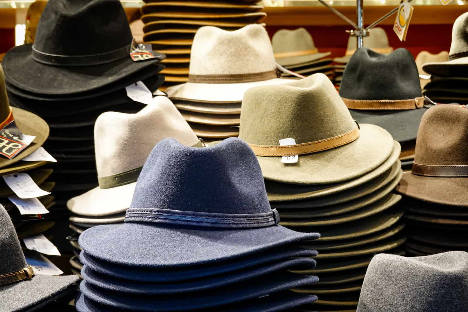 A felt hat resting on a wooden surface