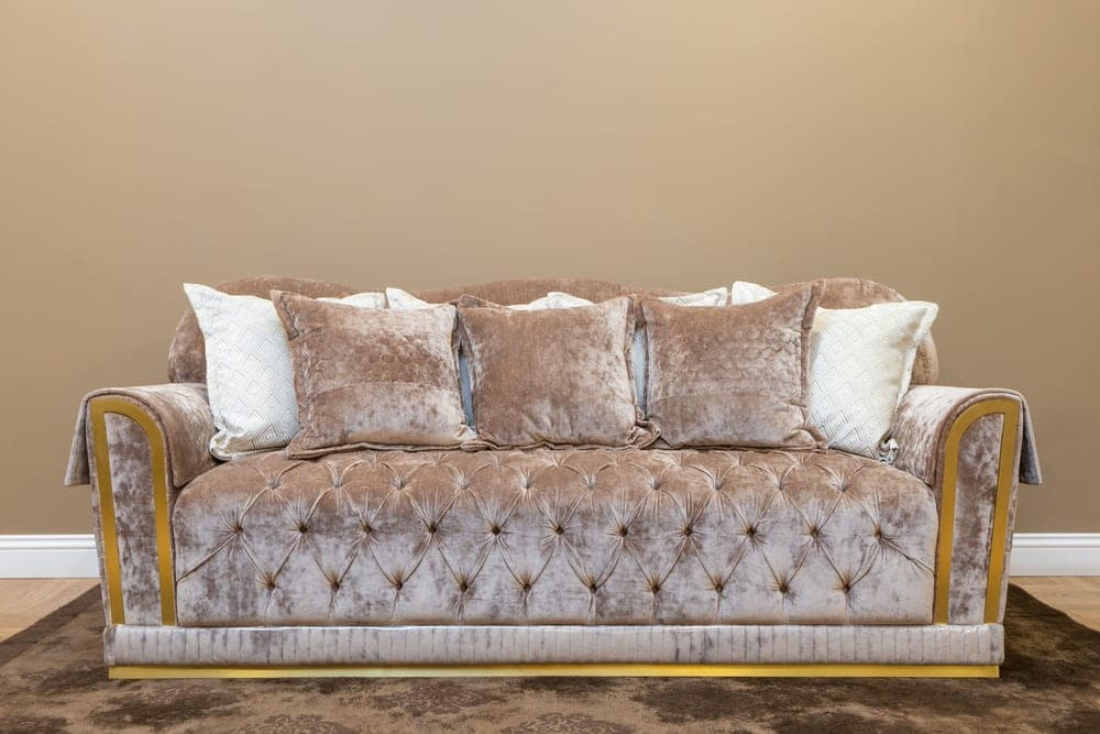 An upholstered sofa arm in soft daylight